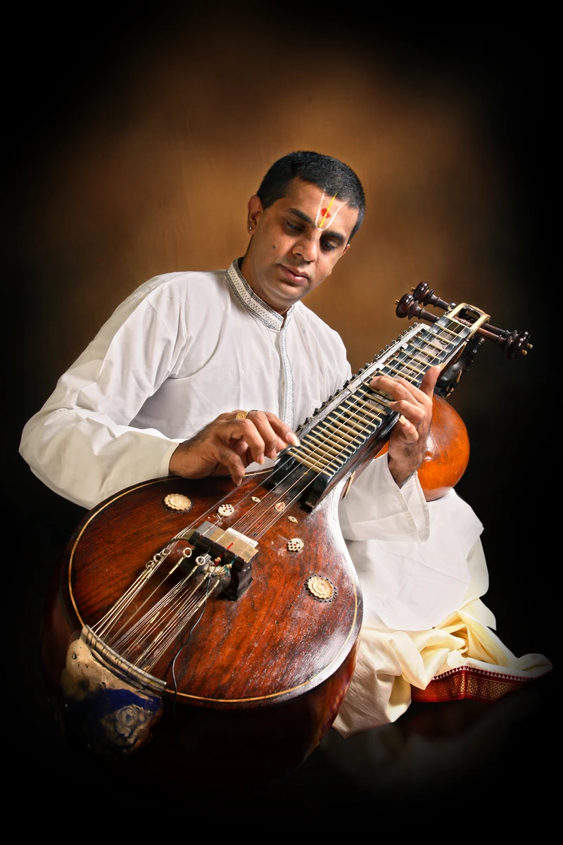 Vidwan Prashanth Iyengar seated with the Saraswati veena