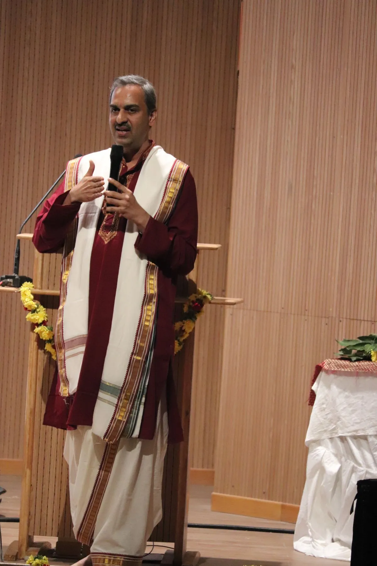Speaker in shawl