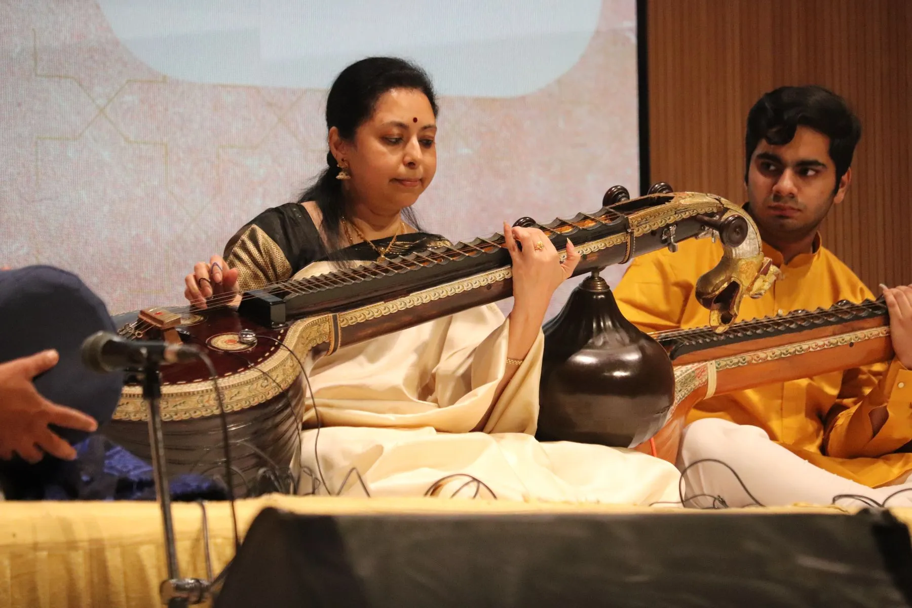 Vainika with student