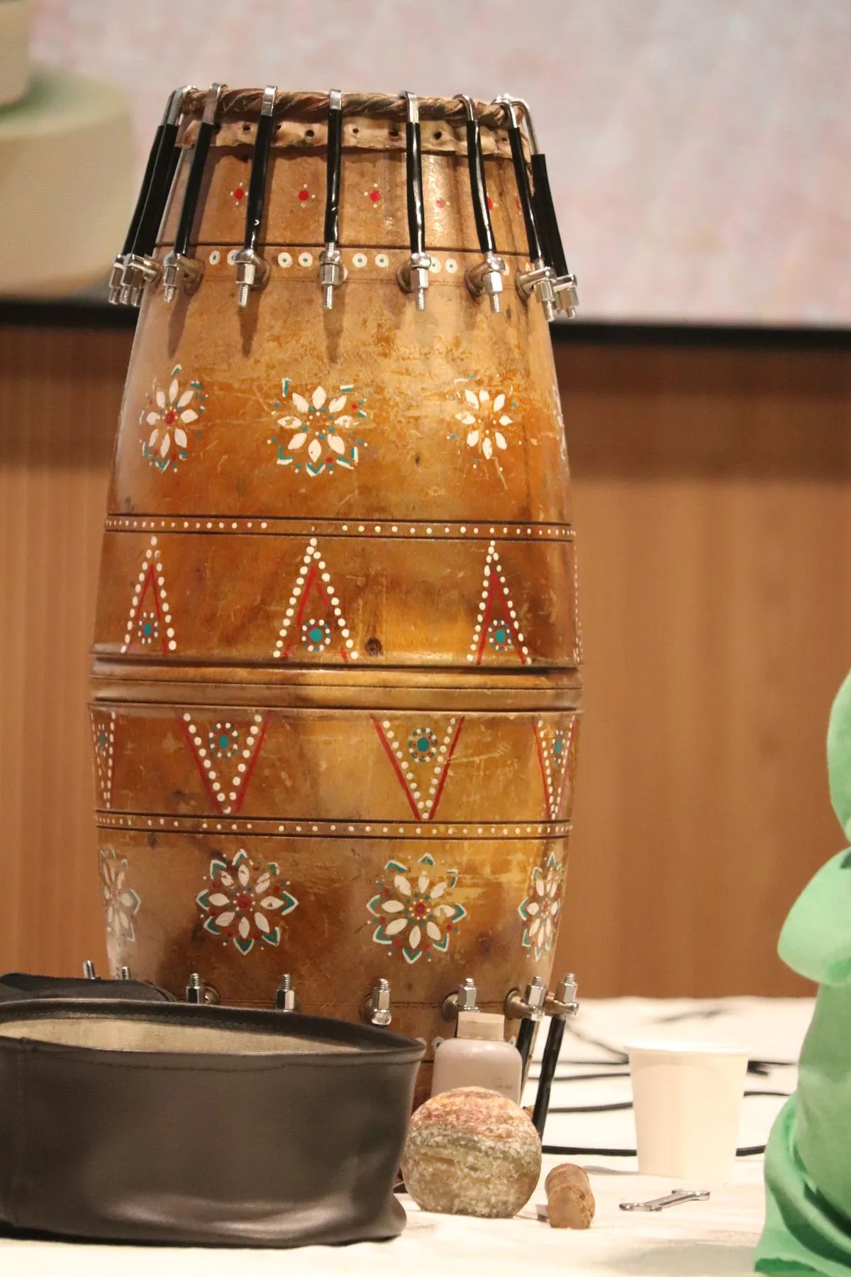 Carved mridangam/drum detail