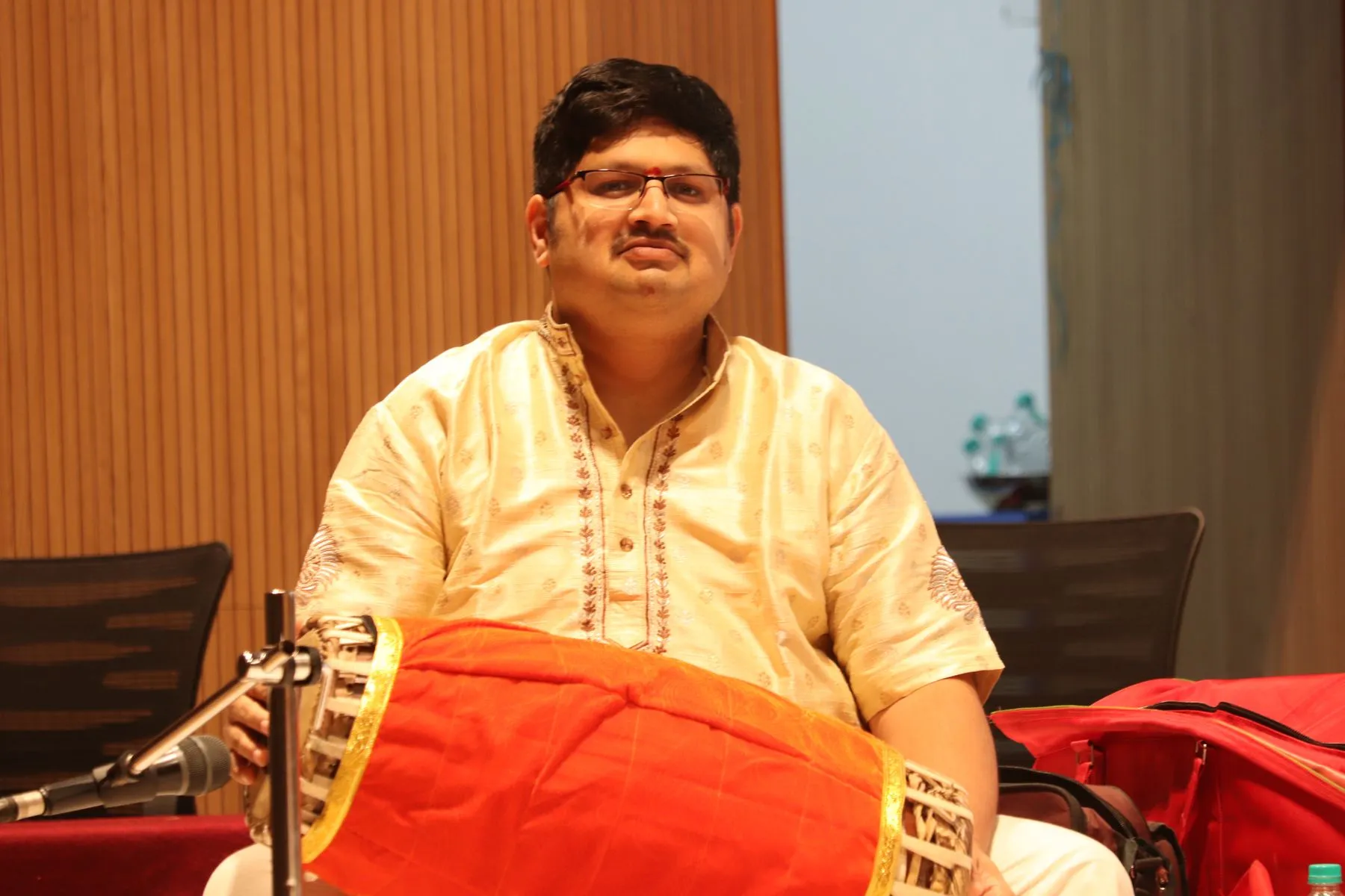 Mridangam artist smiling