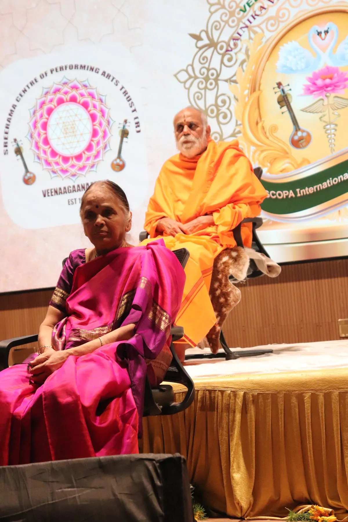 Seer and honoree seated