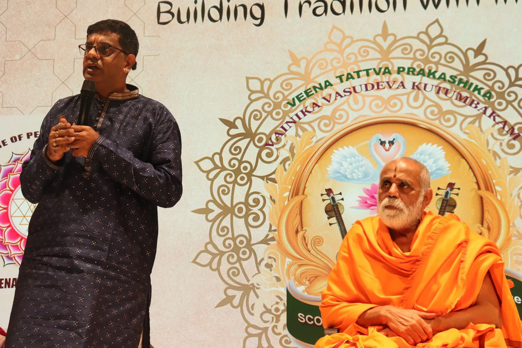 Compere speaking with seer