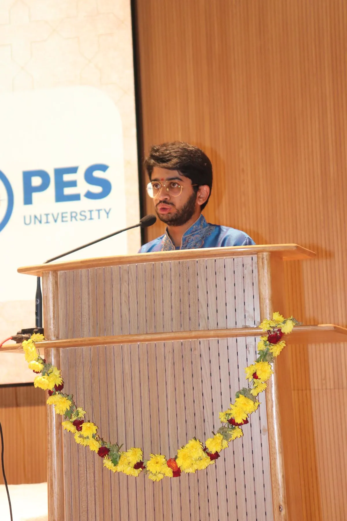 Student speaker at podium